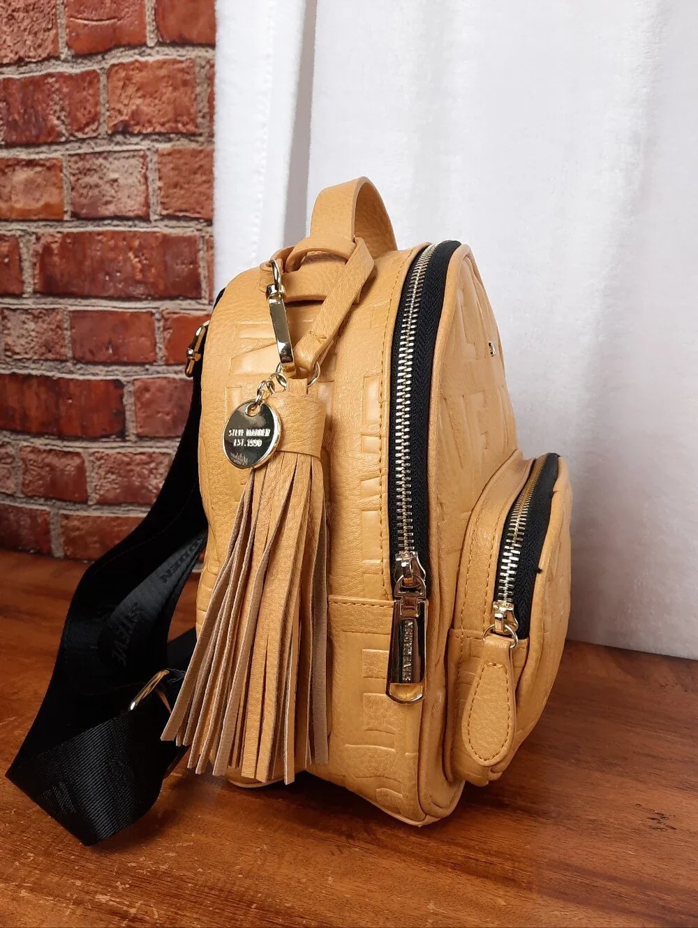 Steve Madden Mustard Mini Tassel Backpack